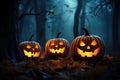 Halloween Pumpkins Arranged On Wood In Forest At Night, Creating Eerie Scene Royalty Free Stock Photo