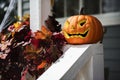 Halloween pumpkins and decorations outside a house Royalty Free Stock Photo