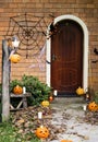 Halloween pumpkins and decorations outside a house