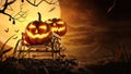 Halloween pumpkins on farm wagon at spooky in night of full moon and bats flying Royalty Free Stock Photo