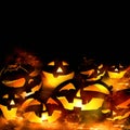 Halloween pumpkins and fire flames black background Royalty Free Stock Photo