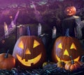 Halloween pumpkins in the grave yard Royalty Free Stock Photo