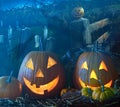 Halloween pumpkins in the grave yard Royalty Free Stock Photo