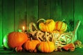 Halloween pumpkins in green light