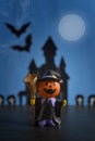 Halloween pumpkins jack-o-lantern on dark blue background. Halloween pumpkin background. Royalty Free Stock Photo