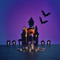 Halloween pumpkins jack-o-lantern on dark purple background. Royalty Free Stock Photo