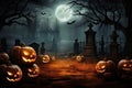 Halloween pumpkins near a tree in a cemetery with a scary house. Halloween background at night forest with moon and bats Royalty Free Stock Photo