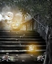 Halloween pumpkins in yard of of old stone staircase night in br Royalty Free Stock Photo