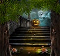 Halloween pumpkins in yard of of old stone staircase night Royalty Free Stock Photo