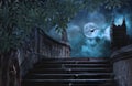 Halloween pumpkins in yard of of old stone staircase night moonlight Royalty Free Stock Photo