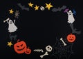 Halloween round frame with funny characters on black background. Copy space.