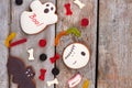 Halloween rustic wooden background with sweets.