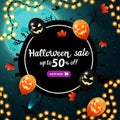 Halloween sale, up to 50% off, black round discount web banner with silhouette of the planet at Halloween night, autumn leafs Royalty Free Stock Photo