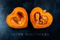 Halloween scary Night Pumpkin splitted to half hearts. Dark creepy background. Happy Halloween horror