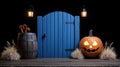 Halloween scene with a blue door pumpkin barrel and decorative elements Royalty Free Stock Photo