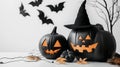 Halloween scene with pumpkins, bats, and a witch hat Royalty Free Stock Photo