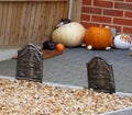 Halloween Scene with pumpkins and gravestones Royalty Free Stock Photo
