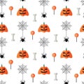 Halloween seamless pattern with flat icons pumpkins and spiders on a white background. Royalty Free Stock Photo