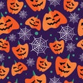 Halloween seamless pattern with flat icons on a purple background. Royalty Free Stock Photo