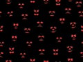 Halloween seamless pattern with scary face. Red evil eyes on black background. Ghost mask. Festive background design for banners Royalty Free Stock Photo