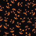 Halloween seamless pattern with scary pumpkin faces on black background. Easy to edit vector template for greeting card, banner, Royalty Free Stock Photo