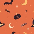 Halloween seamless pattern with silhouettes of holiday symbols