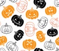 Halloween seamless pattern, vector. Black and orange pumpkin print with funny faces, white background Royalty Free Stock Photo