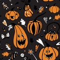 Halloween seamless vector pattern with different orange pumpkins on dark background Royalty Free Stock Photo