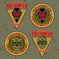 Halloween set of four vector colored emblems, badges, labels or logos with devil head and zombie head in cartoon style Royalty Free Stock Photo