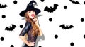 Halloween. witch with bright holiday makeup. Beautiful surprised young woman posing in witches costume