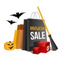 Halloween shopping. Paper bags and pumpkin. Royalty Free Stock Photo