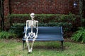 Room to sit beside a friendly skeleton Royalty Free Stock Photo