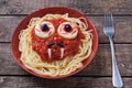 Halloween spaghetti face with big eyeballs fangs