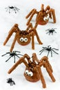 Halloween spider cakes with candy eyes in chocolate, Halloween treats Royalty Free Stock Photo