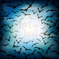 Halloween spooky night with flying bats background paper cut style.Trick or treat vector illustration