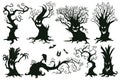 Halloween spooky trees. Cartoon hooked trees, scary halloween trees with muzzles vector illustration set Royalty Free Stock Photo