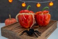 Halloween stuffed pepper monster heads with spaghetti