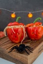 Halloween stuffed pepper monster heads with spaghetti