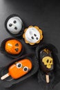 Halloween sweets on black background