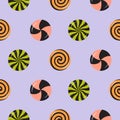 Halloween swirl sweet candies, round lollipops, bonbons seamless pattern.