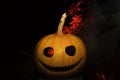 Halloween symbol of pumpkin`s head and red fire
