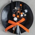 Halloween theme orange and black place setting