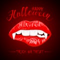 Halloween theme with red female lips and vampire fangs