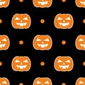 Halloween tile vector pattern with pumpkins and white polka dots on black background Royalty Free Stock Photo