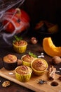 Halloween treats. Muffins with pumpkin, walnuts and cinnamon Royalty Free Stock Photo