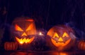 Halloween. Two Jack Lanterns with the attributes of holiday Royalty Free Stock Photo