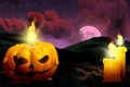 Halloween vivid creepy night texture - pumpkin candle on left and two candles on the right, holiday concept - background design