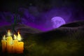 Halloween vivid haunting dark night backdrop - set of candles on left and free space on right side, celebration concept -