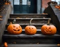 Halloween Welcome: Trio of Jack-o\'-Lanterns on Stoop