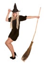 Halloween witch blond in black hat with broom. Royalty Free Stock Photo